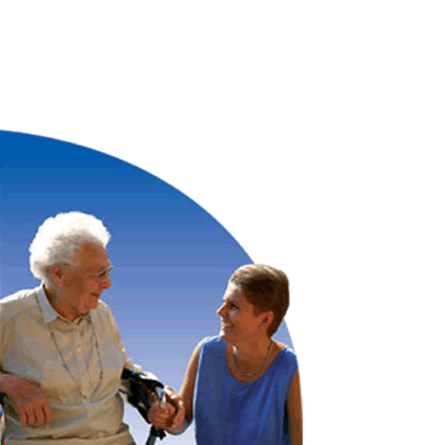 Leben, Wohnen, Pflege -angenehm anders. Eine Seniorin und eine junge Frau sitzen sich lachend gegen&uuml;ber